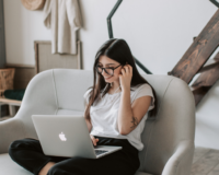 girl looking up video marketing statistics every real estate agent should know