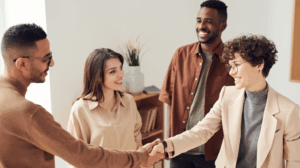 types of sales persons shaking hands in a group